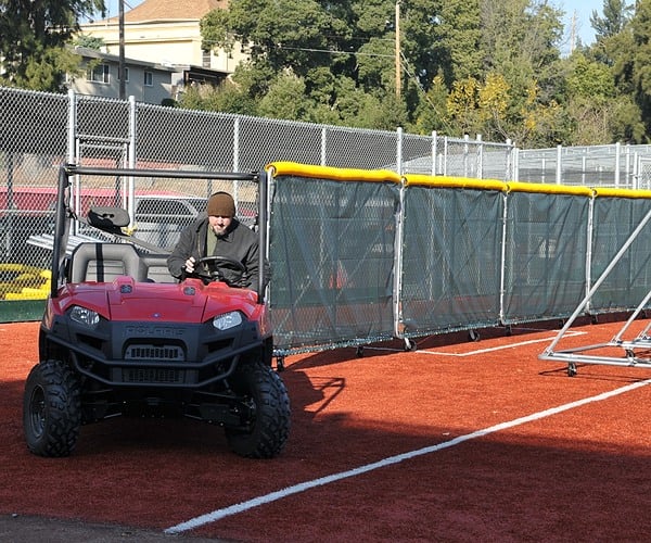 Cart pulling wheeled sections of sportafence